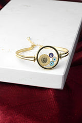 Quarter Model Bracelet – Gold Finish with Blue Eye Enamel; Silver Handcuff